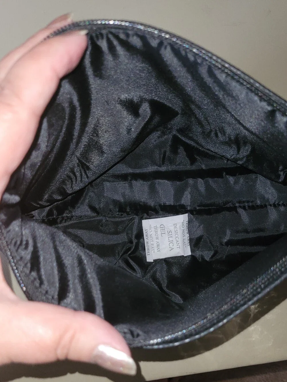 NWT - Perry Ellis Black Wristlet with Pink Trim.